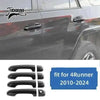 Carbon fiber trim kit for Toyota 4Runner featuring black textured trim pieces.