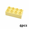 A rectangular yellow set of six chunky building blocks for kids.