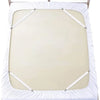 White elastic bed sheet with four corner straps on a wooden bed frame.