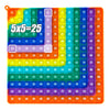 A colorful 5x5 multiplication practice math game board with numbered squares for learning times tables.