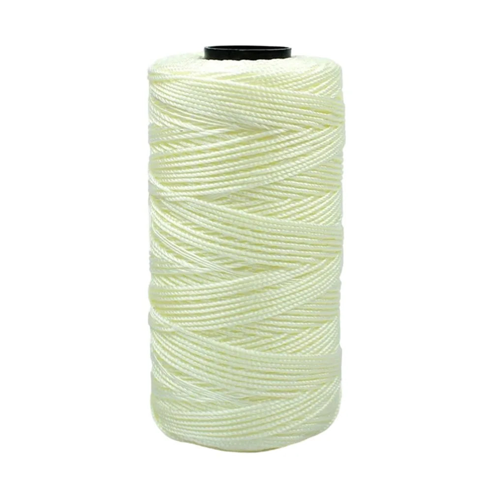 Spool of pale yellow ice cotton silk thread for knitting and crochet