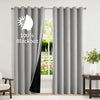 Gray double-layer blackout curtains hanging in a window frame.