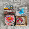 A packaged Metal Fight Beyblade Rock Leone Premium Collector's Edition featuring a red and blue spinning top.
