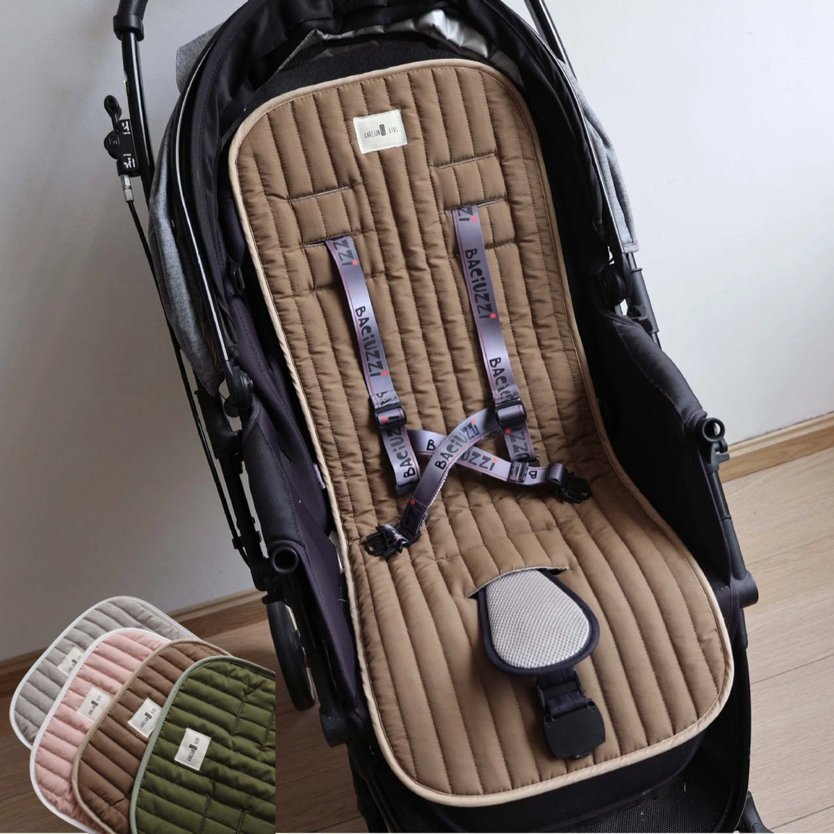 A beige breathable baby stroller seat pad with a quilted pattern and anti-slip features is shown inside a black stroller seat