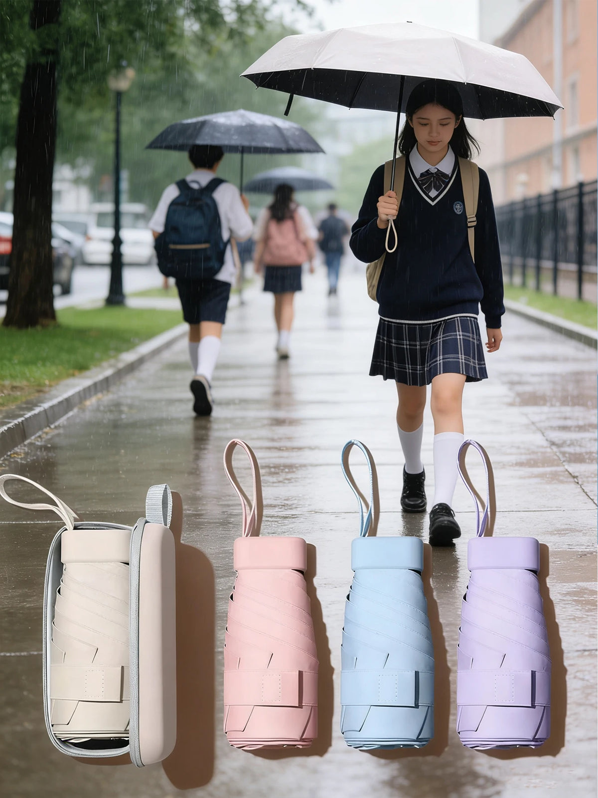 A collection of five ultra-compact 5-fold umbrellas in various pastel colors displayed on a surface.