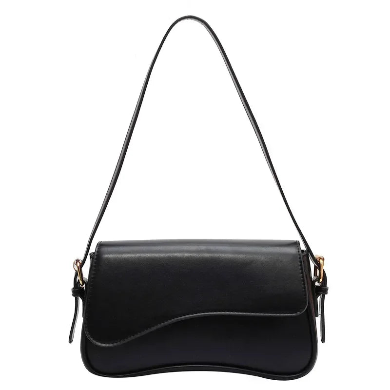Black vintage leather crossbody bag with a flap closure