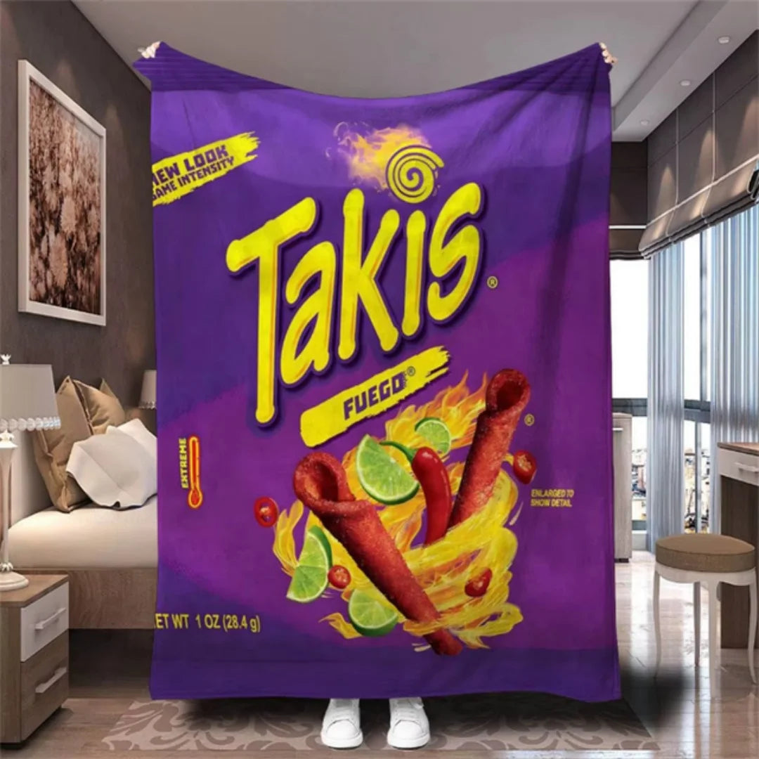A purple Takis branded throw blanket displayed on a hanger.