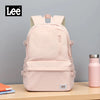 A light pink Lee ultralight water-resistant laptop backpack is shown on a wooden surface.