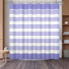 A purple and white striped waffle weave shower curtain hanging in a bathroom setting.