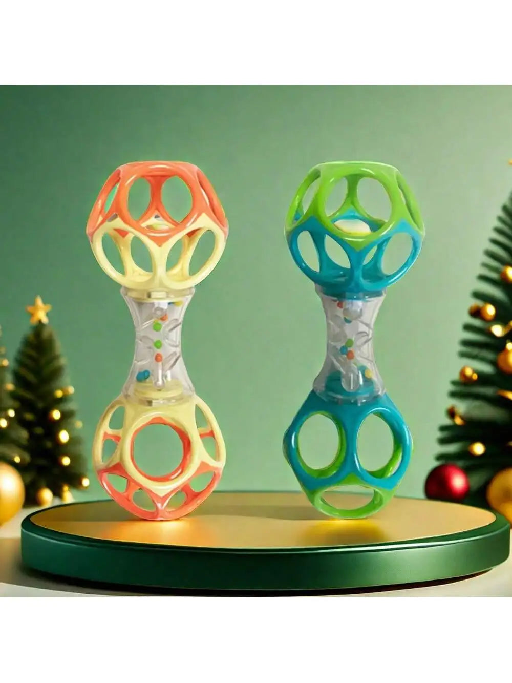 A pair of colorful baby rattle toys with soft teether beads in orange and green on a wooden base.
