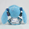 A soft blue Hatsune Miku plush doll with large ears and a white collar.