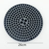 A circular black mesh filter insert for a car wash bucket, featuring numerous small holes.