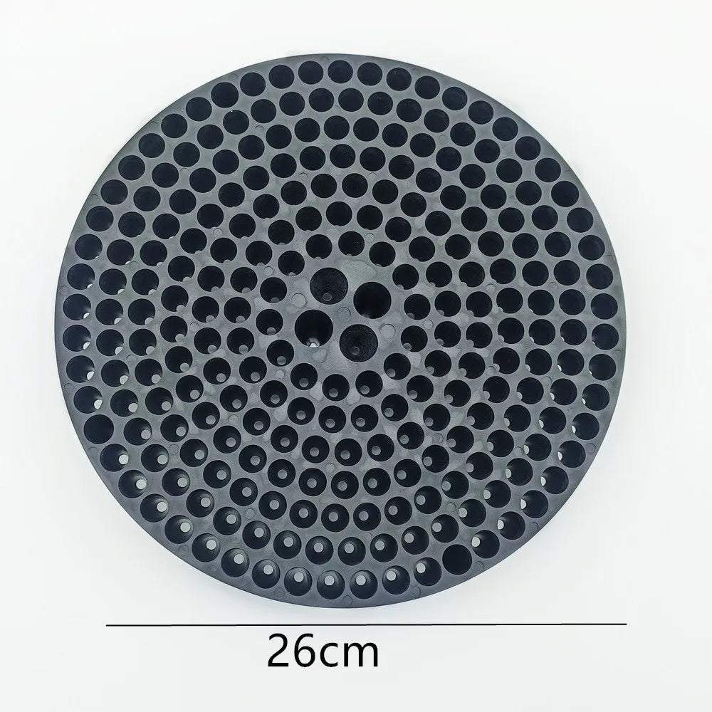 A circular black mesh filter insert for a car wash bucket, featuring numerous small holes.