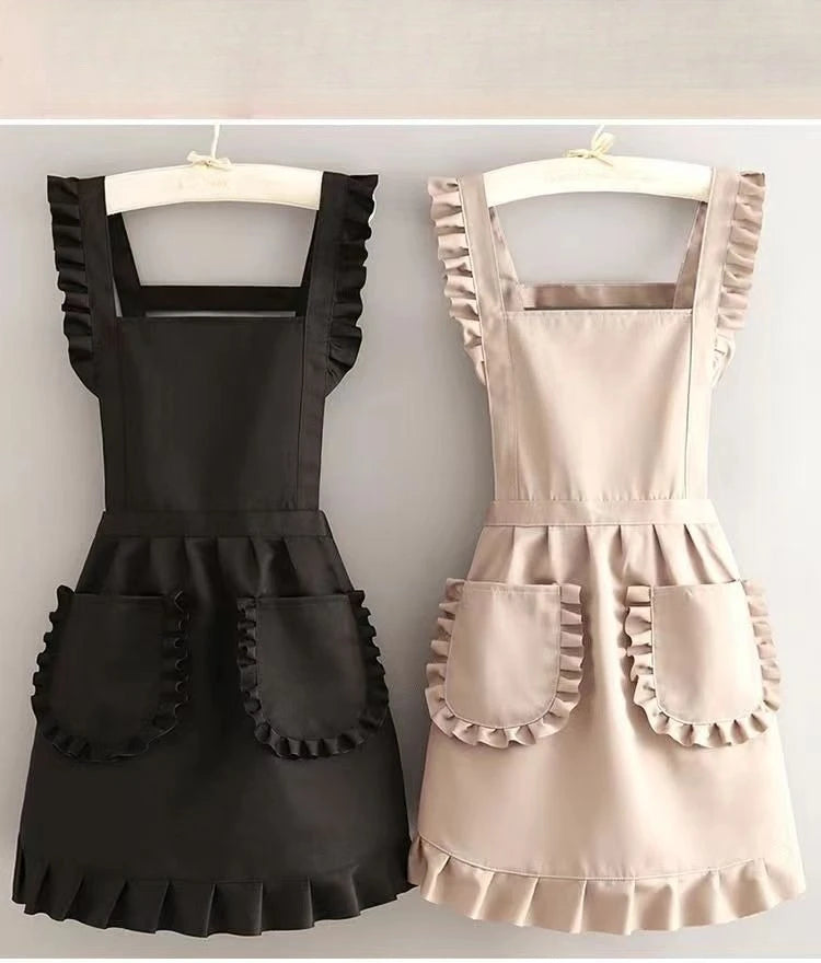 A black Korean style cotton kitchen apron with adjustable neck strap and ruffled details.