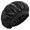 Black silk sleep cap with an adjustable band shown from above.