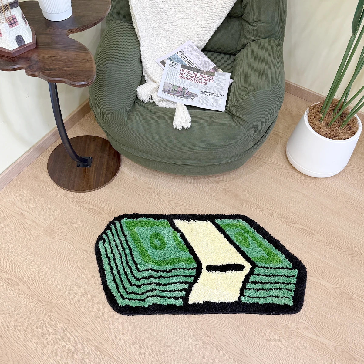 A green tufted mat featuring a cartoon dollar bill design on a light wood floor.