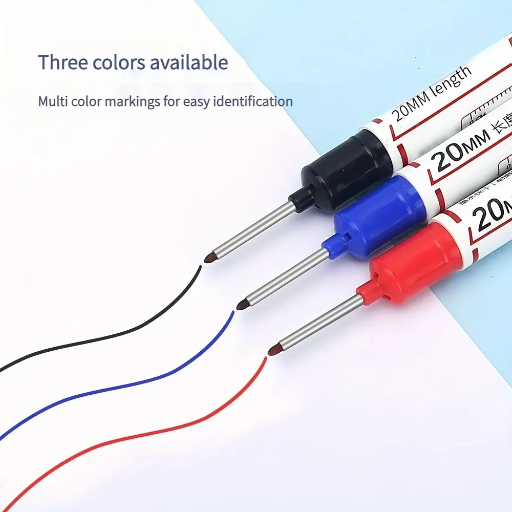Three colored precision markers with long nibs are shown on a white background.