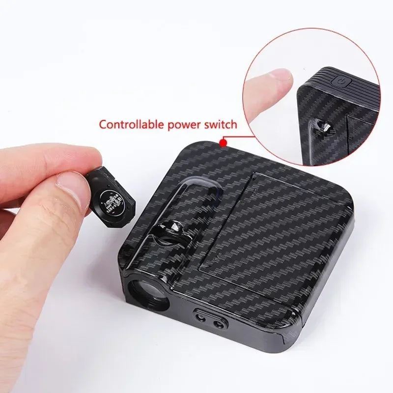 A black wireless LED car door logo projector with a controllable power switch is shown being held by a hand.