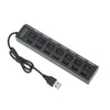 Schwarzer 7-Port-USB-Splitter-Hub mit Ein-/Ausschaltern und Kabel.