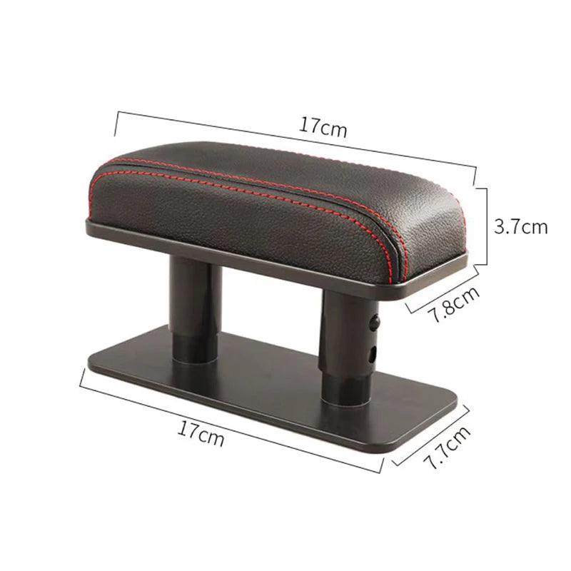 A black car armrest pad with a padded surface and a sturdy base, showing its dimensions.