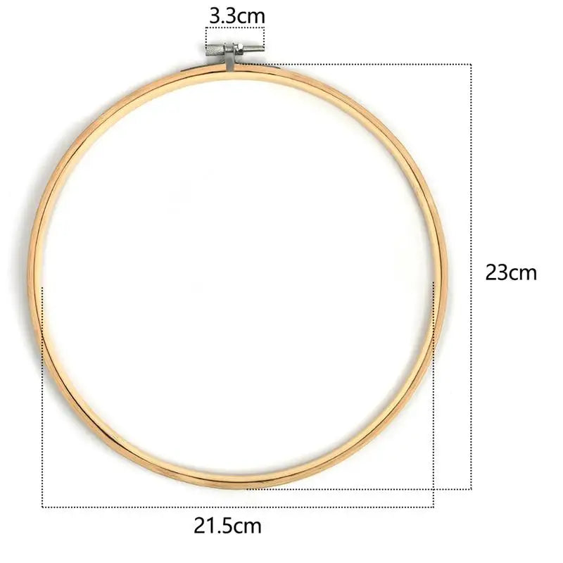 A circular bamboo embroidery hoop with a 3.3cm adjustable screw, measuring 23cm in diameter.