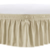 A beige adjustable wrap-around bed skirt with elegant ruffles shown from the front.
