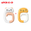 Two pairs of cute cat-shaped silicone bag hooks in white and yellow colors.
