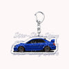 A silver metal key ring attached to a blue sports car keychain.