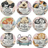 A set of nine DIY diamond art coasters featuring cats in various poses and colors with metal stands.