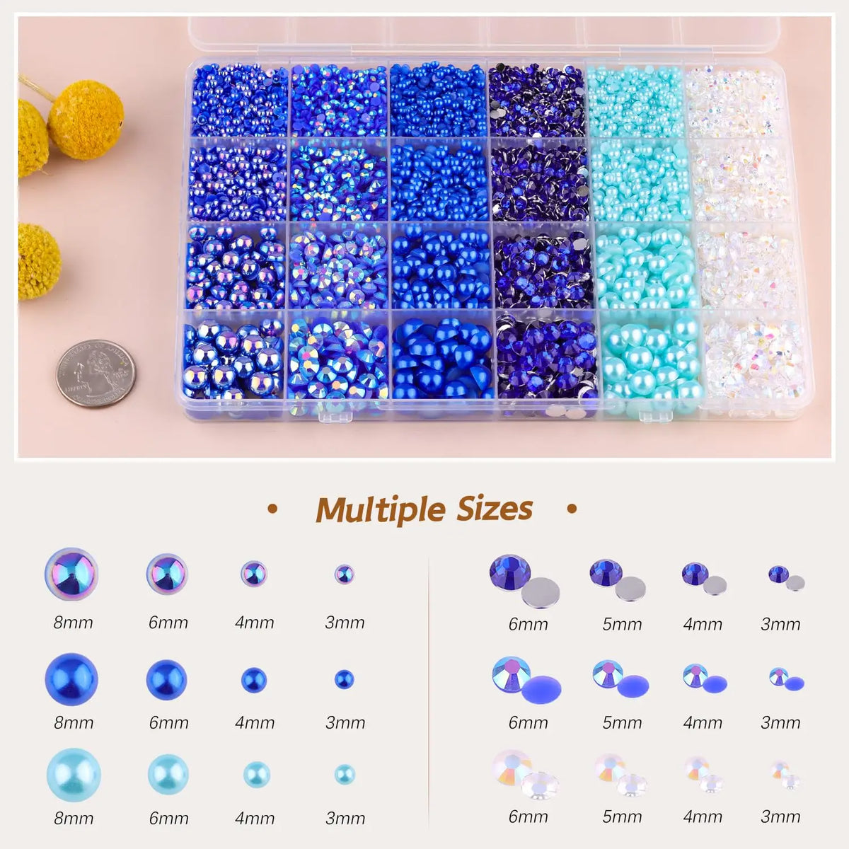 A collection of various sized flatback pearls and rhinestones in different colors packaged in a clear plastic tray.