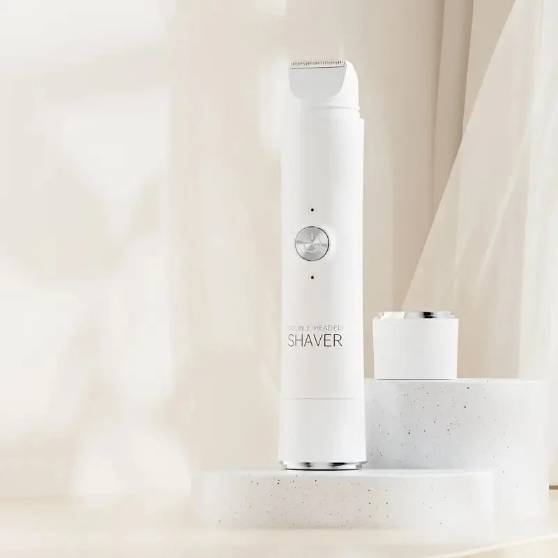 A white 2-in-1 electric shaver standing upright on a light surface.