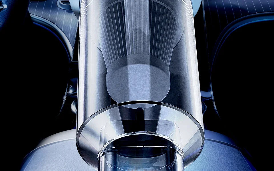 Close-up view of a sleek, modern handheld car vacuum cleaner with a clear cylindrical body and pleated nozzle.