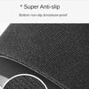 Close-up view of a black non-slip pet feeding mat with a textured surface.