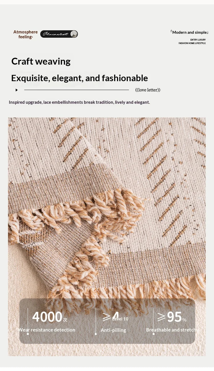 Close-up of a beige woven fabric featuring a delicate fishbone pattern and a fringed edge.