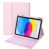 A pink iPad keyboard case with a matching pink cover and a screen displaying a colorful gradient.