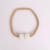 A set of eight elegant pearl magnetic curtain tie-back clips on a golden braided cord.