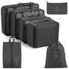 A set of black travel packing cubes and storage organizer bags for clothing.