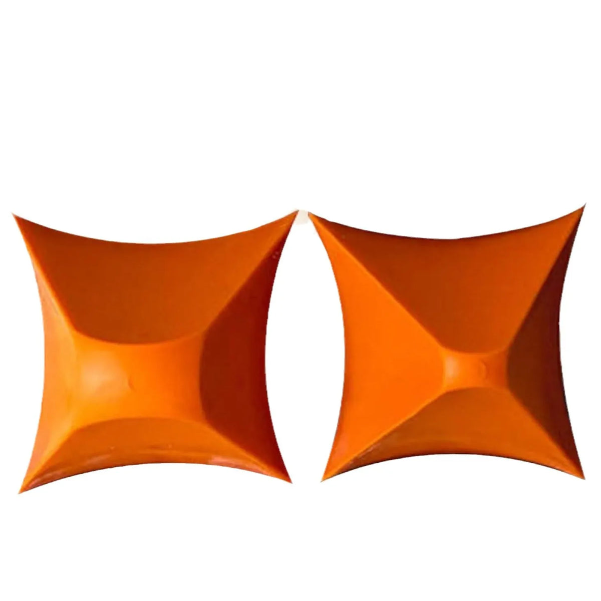 A pair of orange silicone tile grout filling tools with a star-shaped design.