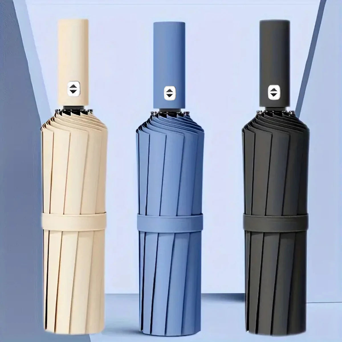 Three versions of an automatic compact folding umbrella in beige, blue, and black.