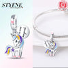 Silver unicorn pegasus charm with rainbow accents and sparkling crystals on a bracelet.