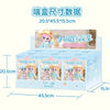 A box of 12 collectible figurine sets featuring characters in a blind box series