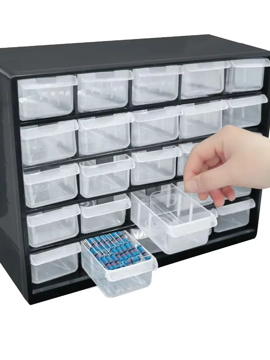 A black wall-mounted organizer with 25 clear plastic compartments and drawers, showing a hand interacting with the bottom sec