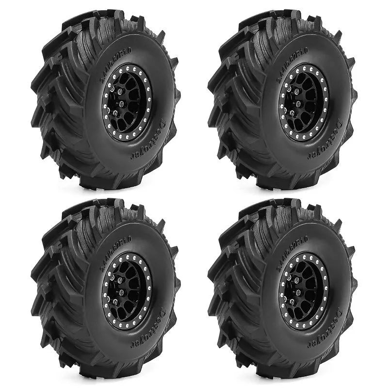 Set of four black metal beadlock RC crawler wheels with tires