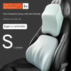 A memory foam car headrest and lumbar support pillow in light gray is shown on a black seat.