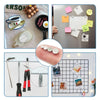 A collection of colorful and shaped refrigerator magnets including food items, greeting cards, and decorative elements.