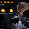 A hand holds a gray mini cordless screwdriver kit with a built-in LED light, positioned over an electronic circuit board.