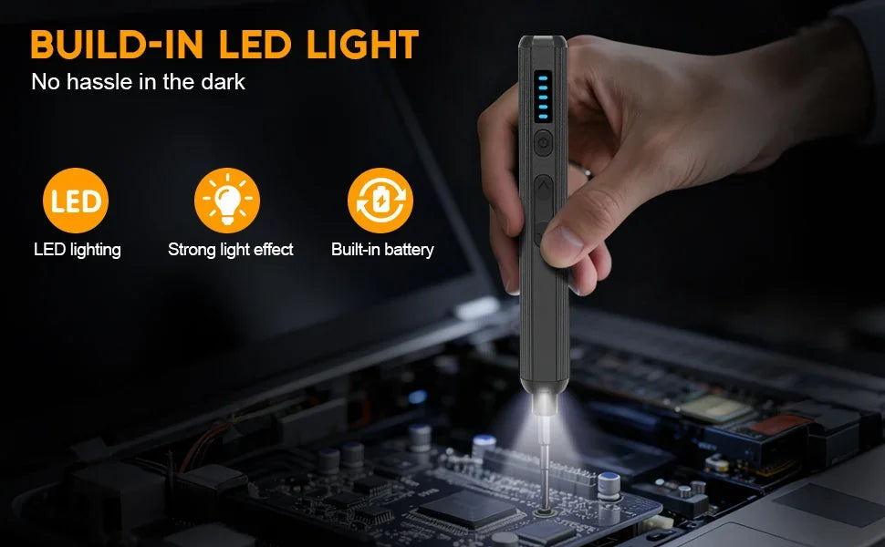 A hand holds a gray mini cordless screwdriver kit with a built-in LED light, positioned over an electronic circuit board.