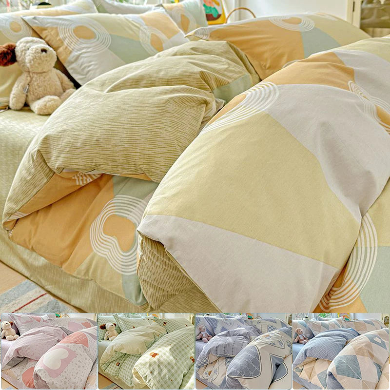 A set of beige and cream cotton duvet covers and pillow shams featuring geometric patterns and a teddy bear decoration.