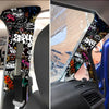 A close-up view of a graffiti pattern velvet car interior wrap sticker applied to the side of a vehicle's interior panel.