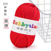 A ball of bright red soft T-shirt yarn for crochet and knitting is shown against a wire mesh background.